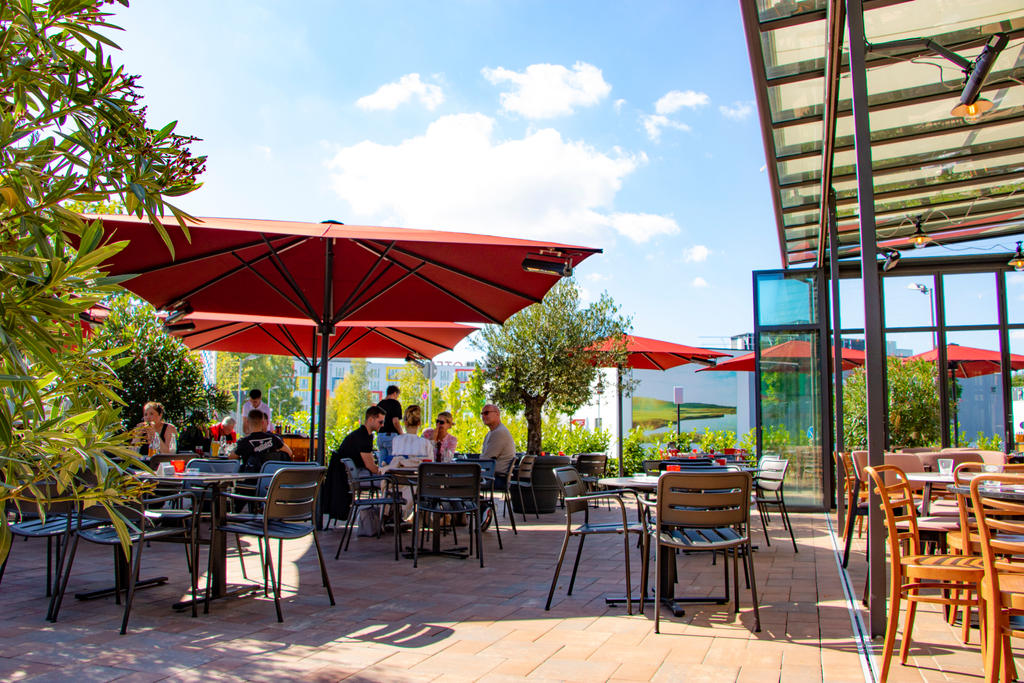 Patio with red parasols