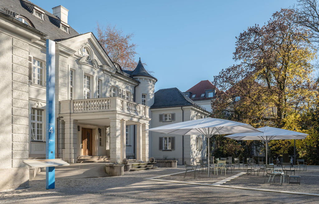 Courtyard with white parasols