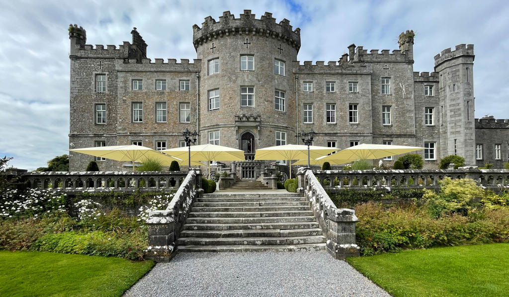 Markree Castle, Collooney Ireland with beige SCHATTELLO parasols Castle with a terrace and beige parasols