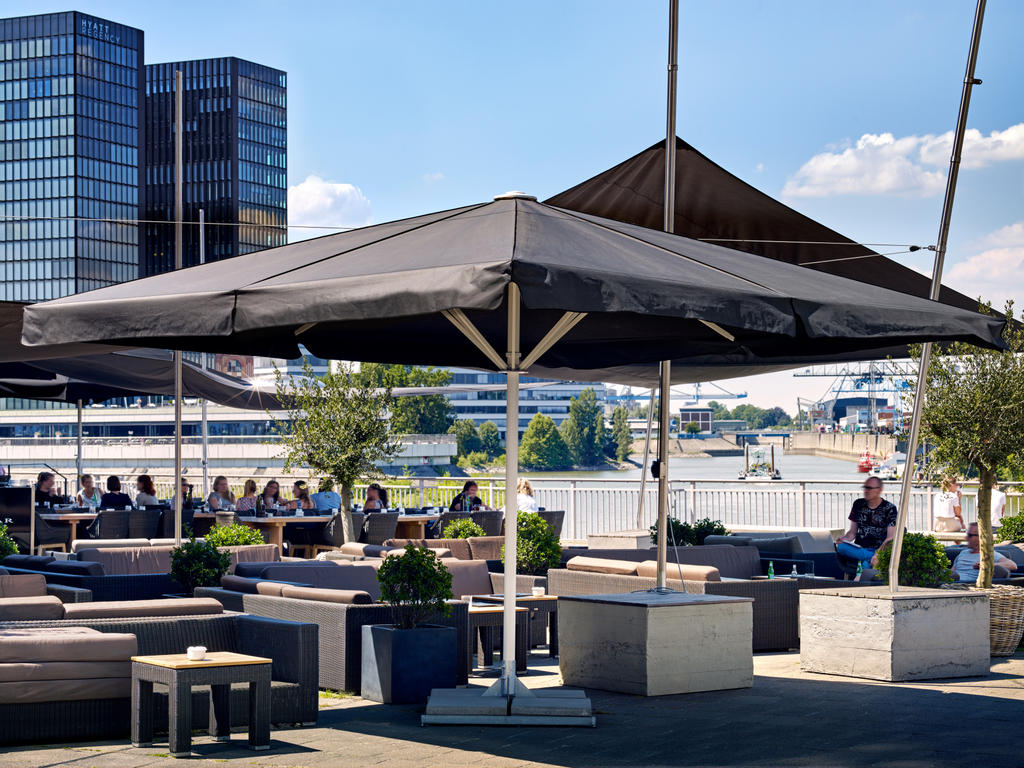 Patio with black parasols