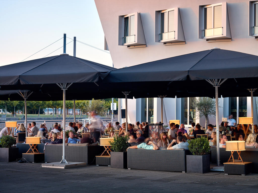 Patio with black parasols