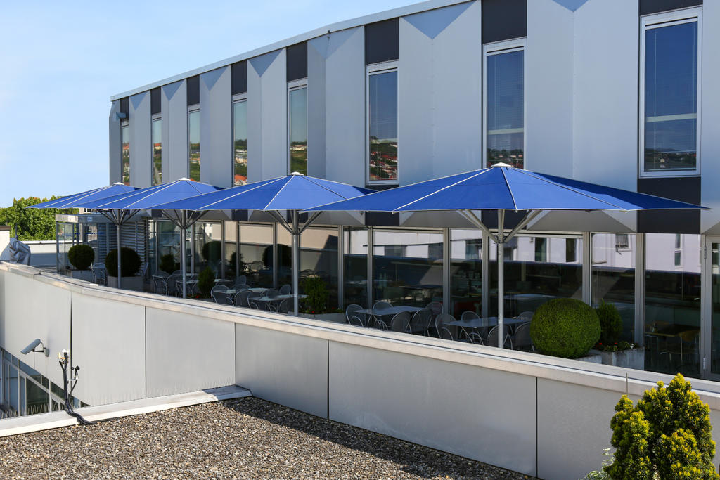 Patio with blue parasols