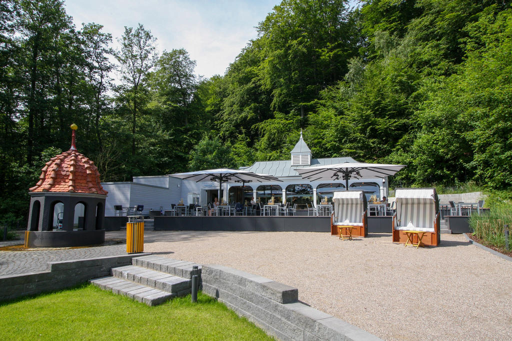 Terrace with white parasols