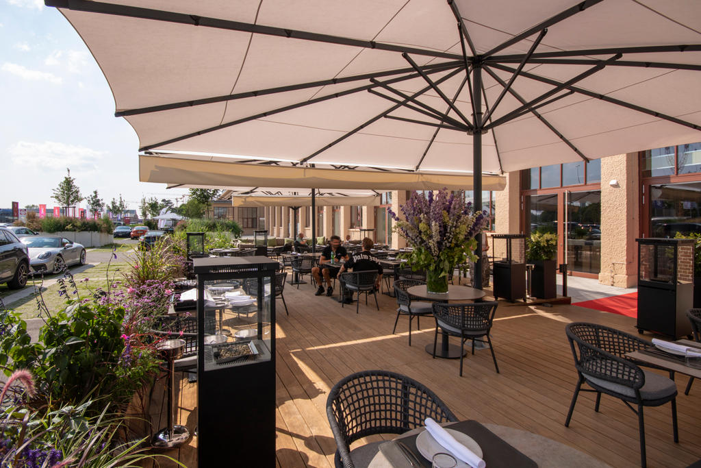 Patio with beige parasols