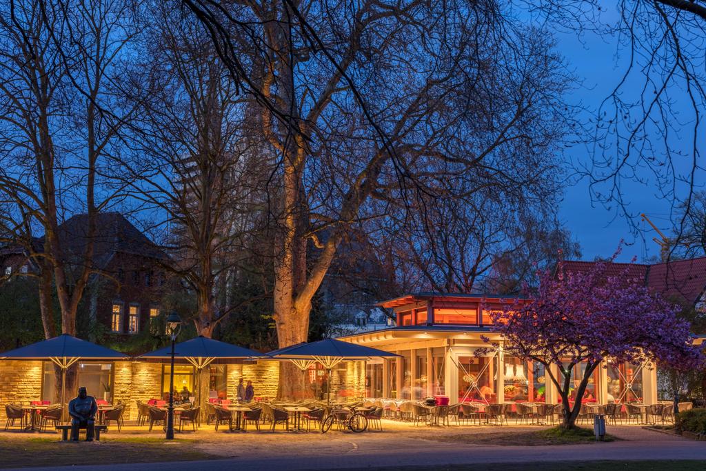 Patio with grey parasols