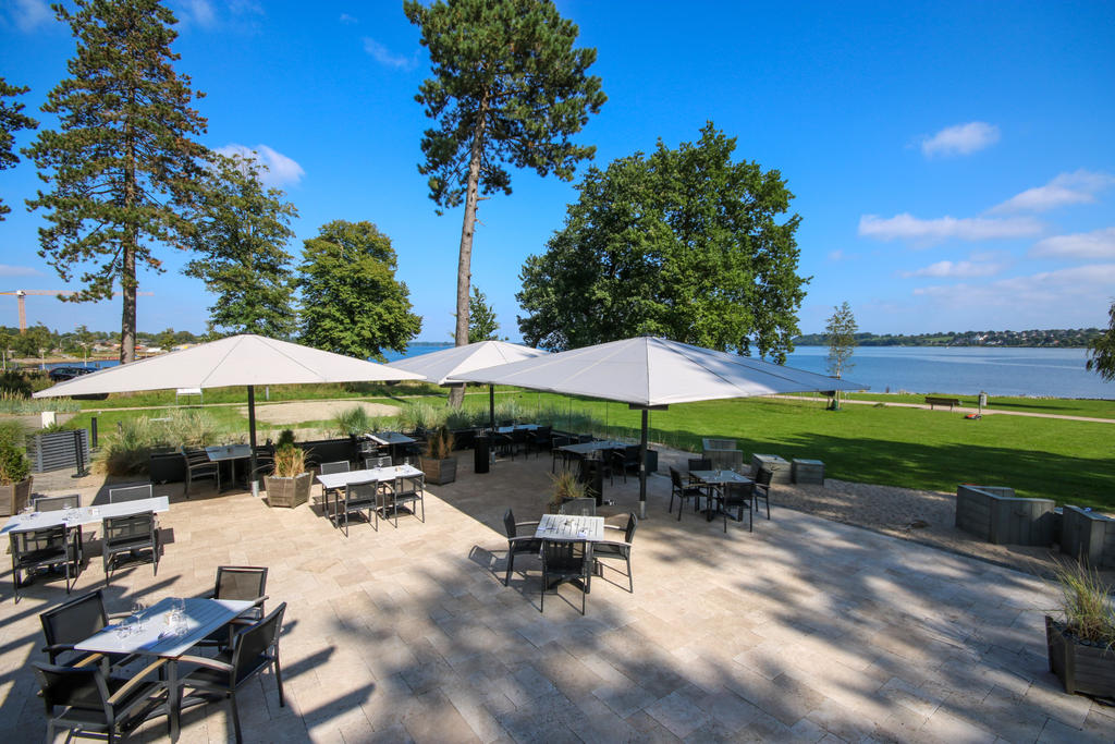 Patio with beige parasols