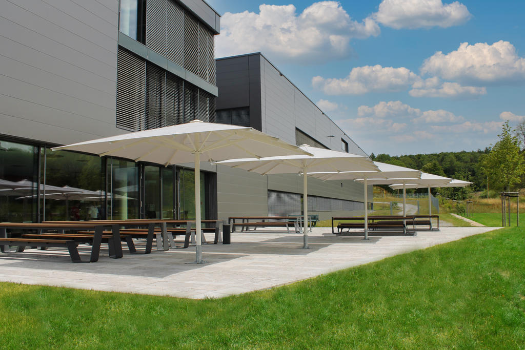 Patio with white parasols