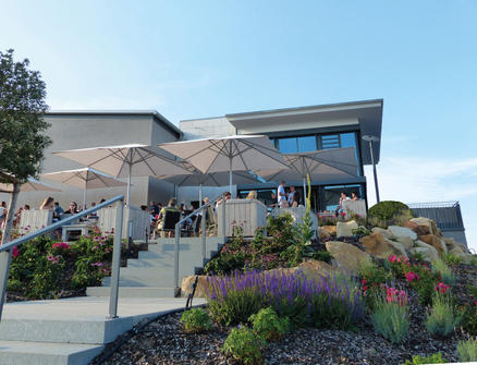 Patio with beige parasols