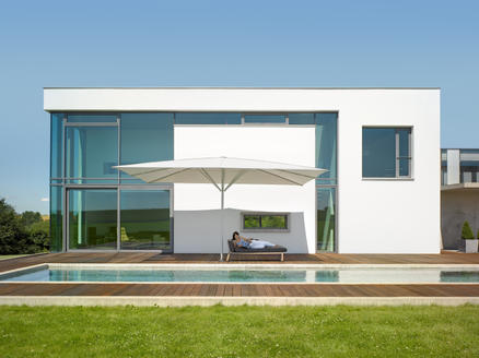 Patio with white parasols