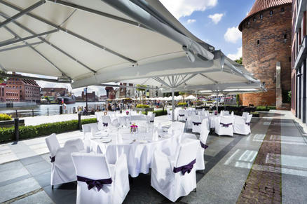 Patio with white parasols