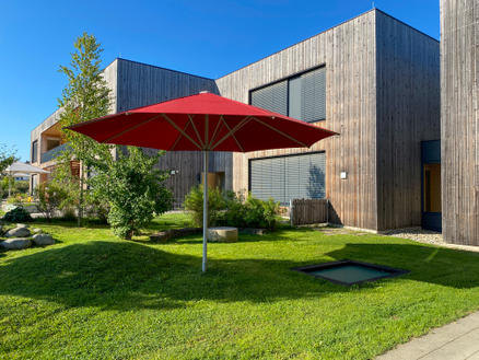 Terrace with red parasols