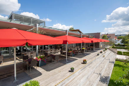 Patio with red parasols