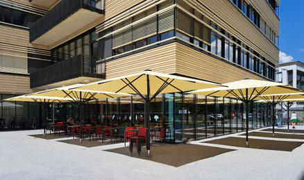 Terrace with large yellow parasols