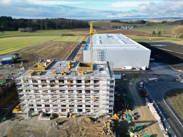 MAY New assembly hall and office