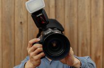 Speedlight Basics: Everything you need to know about on-camera flash Man hold camera with Speedlight attached