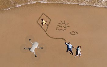 DJI Mini 2 – DJI’s Latest Palm Sized Drone Offers Loads of Improvements DJI Mini 2 in air above beach