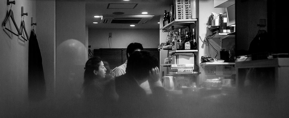 People in restaurant by Rudi Rincker