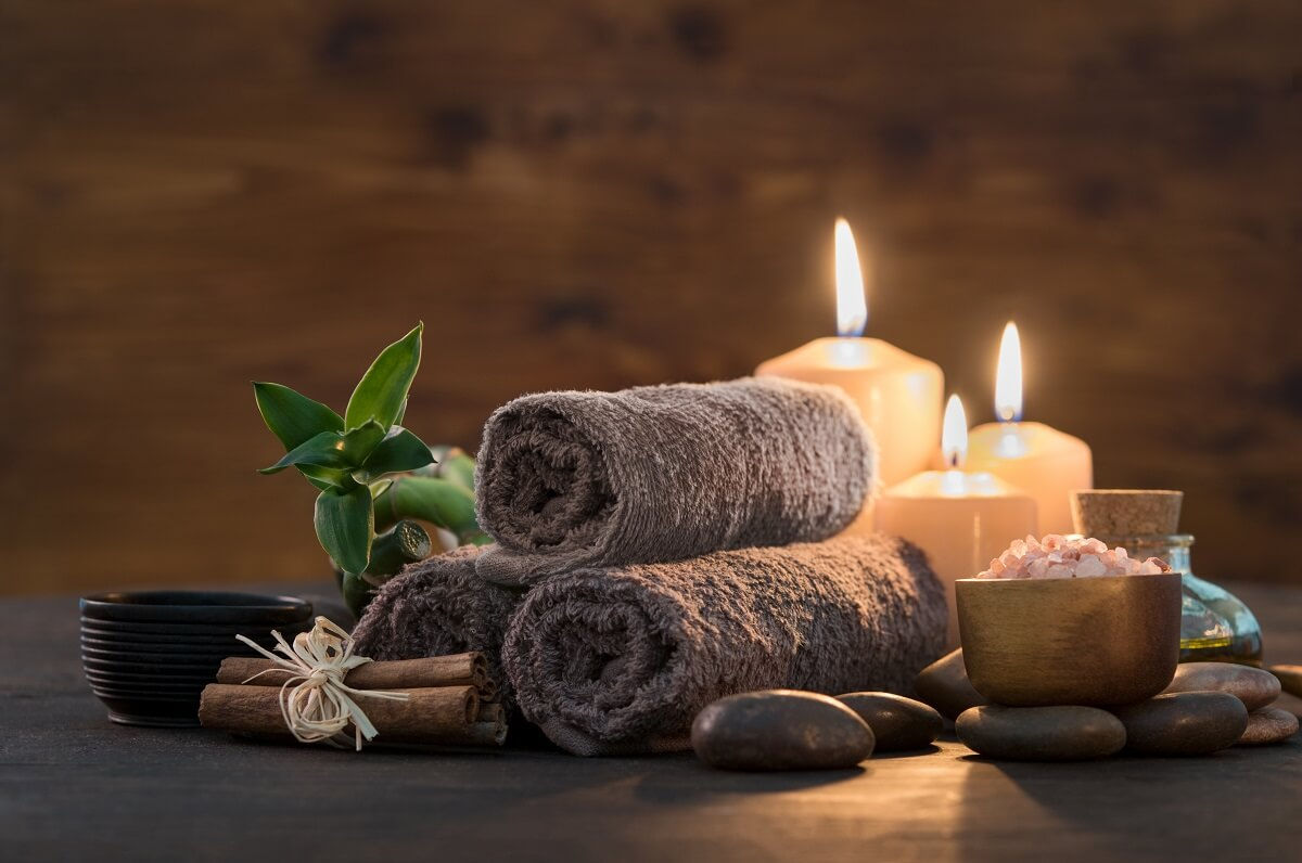 Spa towels, candles and calming treatment details