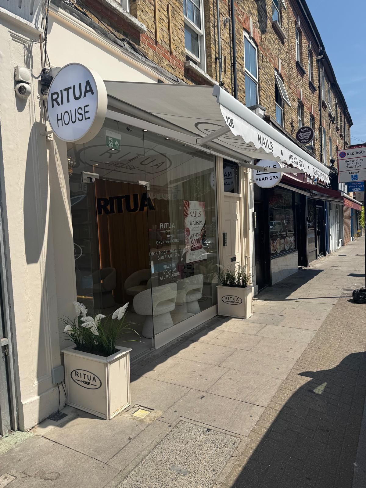 Side view of the RITUA HOUSE salon frontage on Battersea Park Road