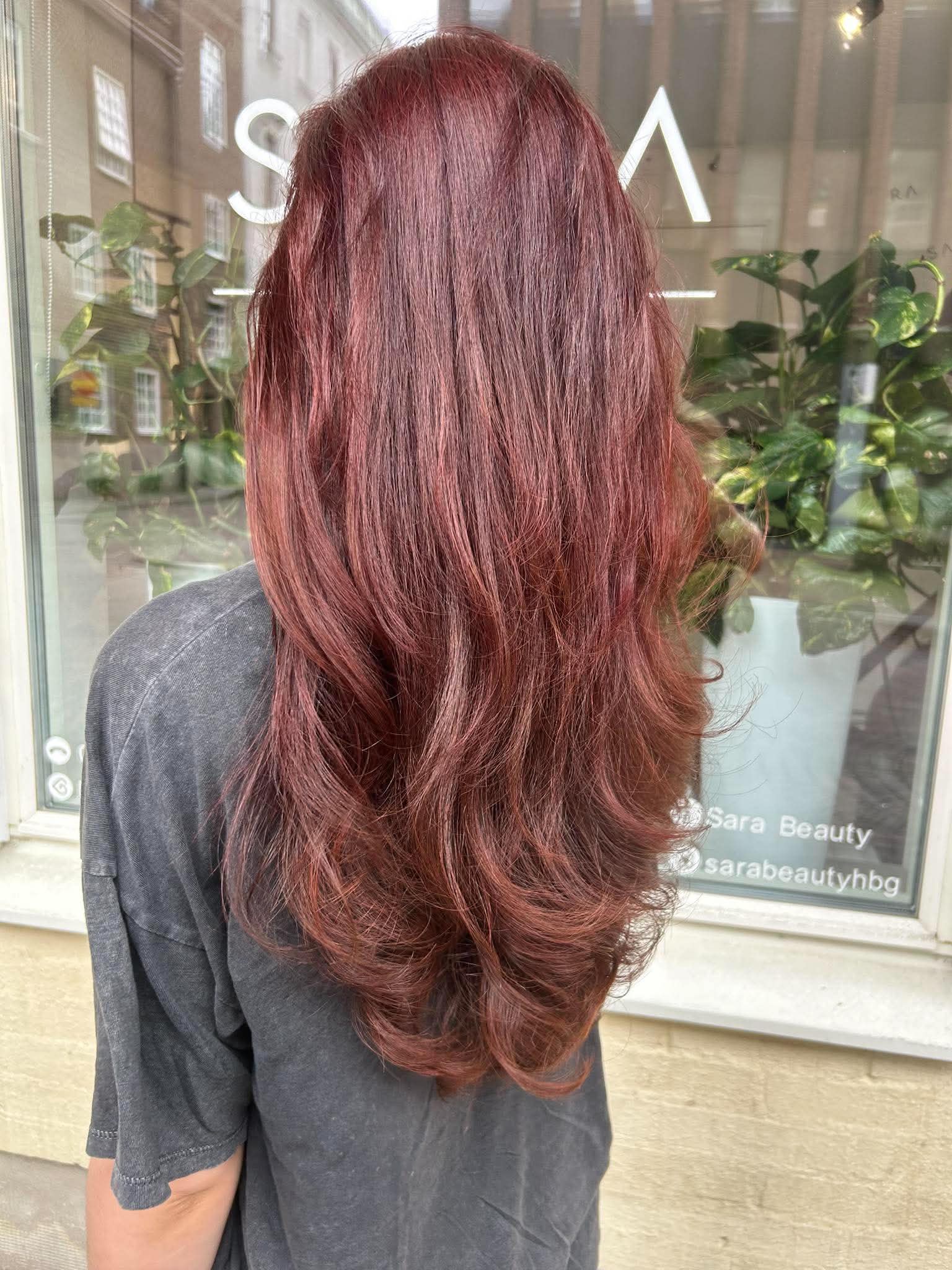Long glossy hair result at Sara Beauty
