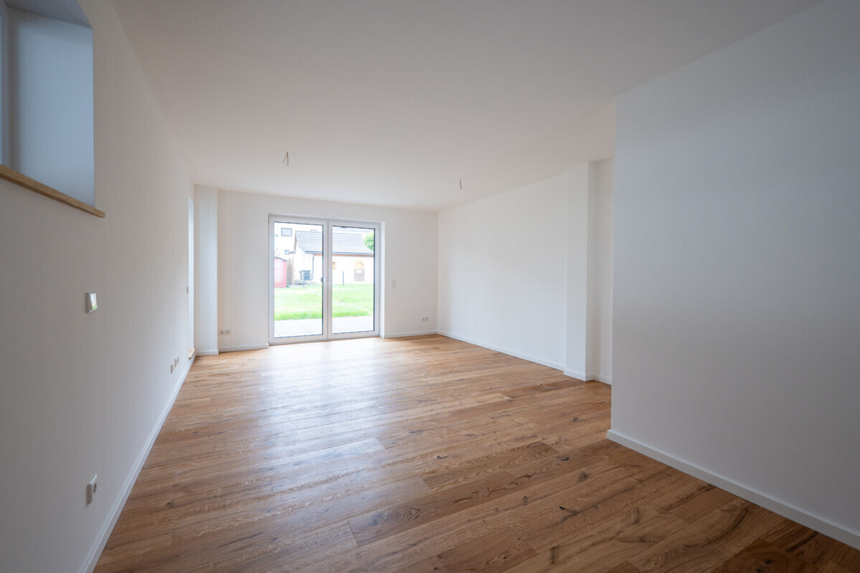 Wohnzimmer – Doppelhaushälfte in Siegburg, Bild 6