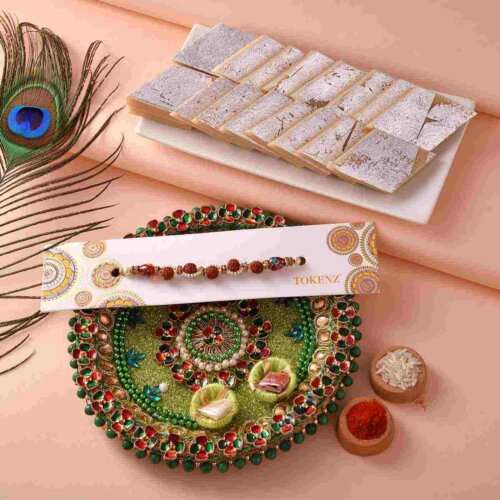 Elegant white beads and Rudraksh Rakhi with Kaju Barfi & 5inch Thali