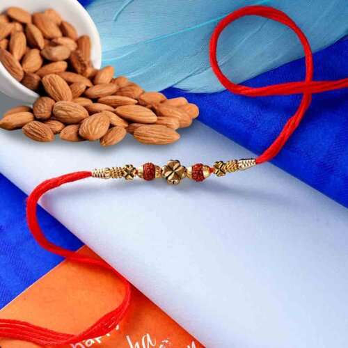 Artistic Rudraksha rakhi with Natural Almonds 113 Gms