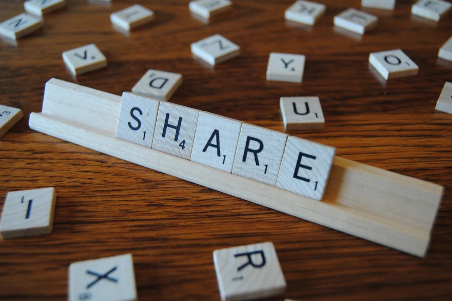 Scrabble letters arranged in the word Share