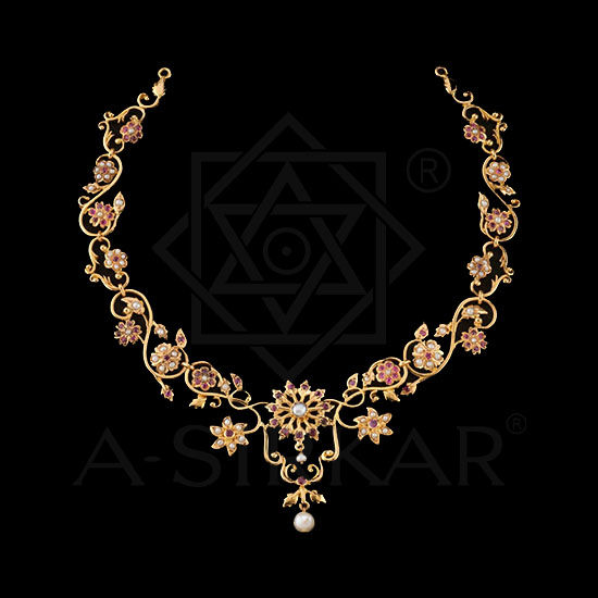 Floral pendant with gold petals and vibrant beads perched in the