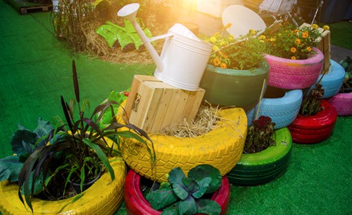 Upcycling used tyres into garden planters