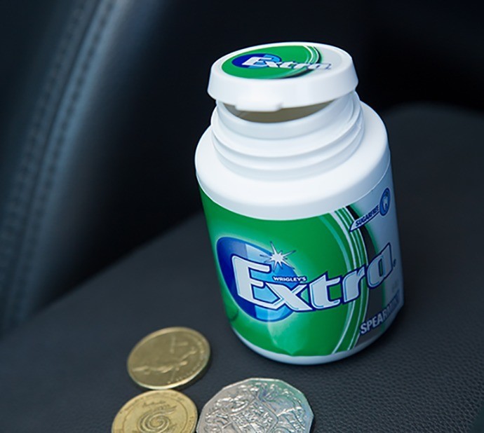 Use an Empty Gum Container to Store Loose Change