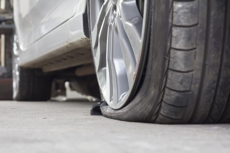 The tyre burst due to poor wheel alignment