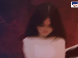 A blurred and distressed-looking girl in a white dress is in the foreground, with a dark and ominous background. A shadowy figure appears in the distance, creating a sense of fear and danger. The image has a somber and unsettling tone, symbolizing vulnerability and threat.