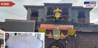 Shri Kshetra Dehu's Sant Tukaram Maharaj temple decorated for the unveiling ceremony of the world's largest turban, featuring a grand entrance adorned with flowers and a prominent Garuda statue above the gate. Inset image shows a close-up of the massive white turban, crafted from 450 meters of fabric.