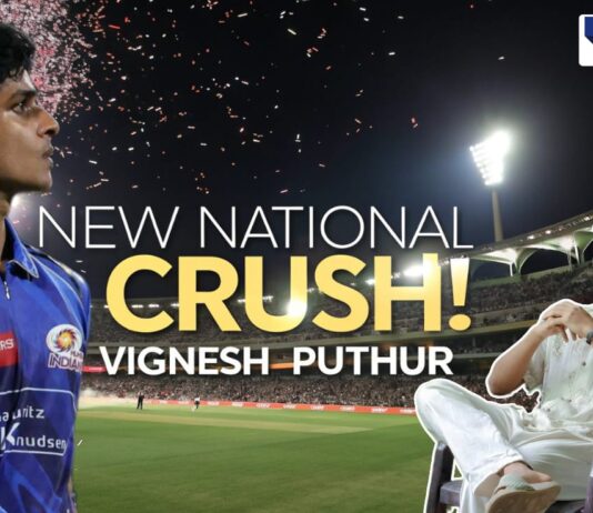 A stadium at night with bright floodlights and fireworks in the sky. On the left, a young cricketer in a Mumbai Indians jersey looks ahead with focus. On the right, the same person is sitting casually in a white outfit, smiling. Bold text in the center reads 'New National Crush! Vignesh Puthur.' The scene captures his rising fame and viral popularity.