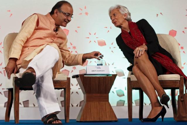 India's Finance Minister Arun Jaitley speaks with IMF Managing Director Christine Lagarde after delivering his closing address during the "Advancing Asia: Investing for the Future" conference in New Delhi,