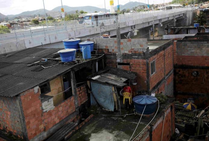 Buses cross a bridge of the Transolimpica BRT in Rio de Janeiro