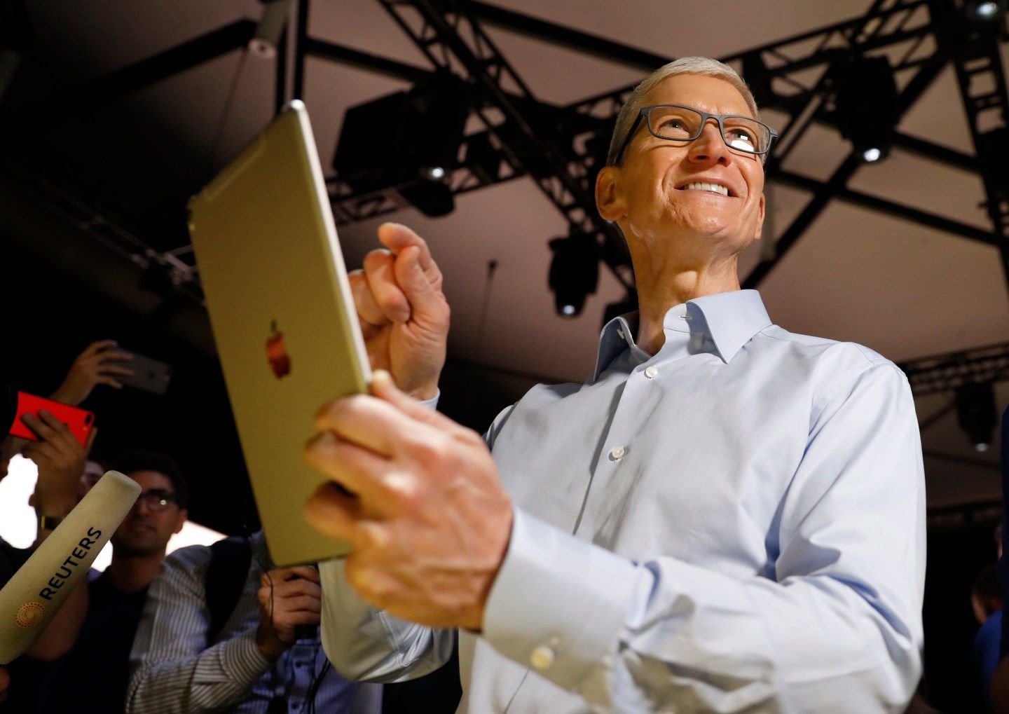 Tim Cook, CEO, holds an iPad Pro after his keynote address to Apple's annual world wide developer conference (WWDC) in San Jose
