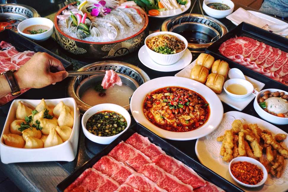 The spread at Hai Di Lao,  chain of hot pot restaurants founded in Jianyang, Chengdu, Sichuan Province, China, in 1994.