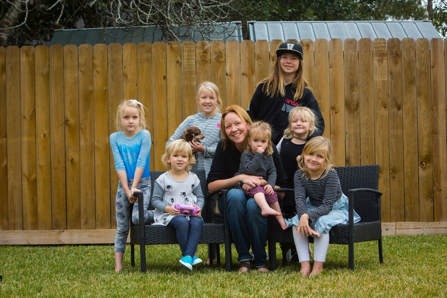 Houston Chronicle editor Jennifer Radcliffe, with her seven children.  Annie Mulligan