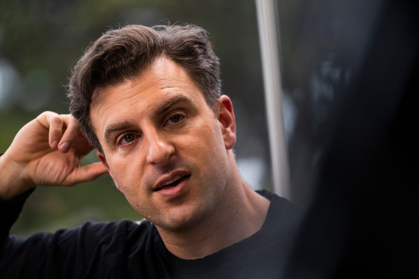 Brian Chesky, co-founder and chief executive officer of Airbnb Inc., during an interview on "The Circuit with Emily Chang" at his home in San Francisco, California, US, on Monday, March 22, 2023. Chesky reflected on his company's triumphant IPO and what's happened since. Photographer: Philip Pacheco/Bloomberg via Getty Images