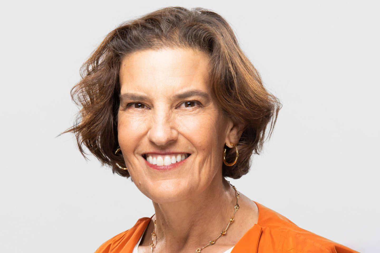 portrait of a woman in business professional clothing smiling