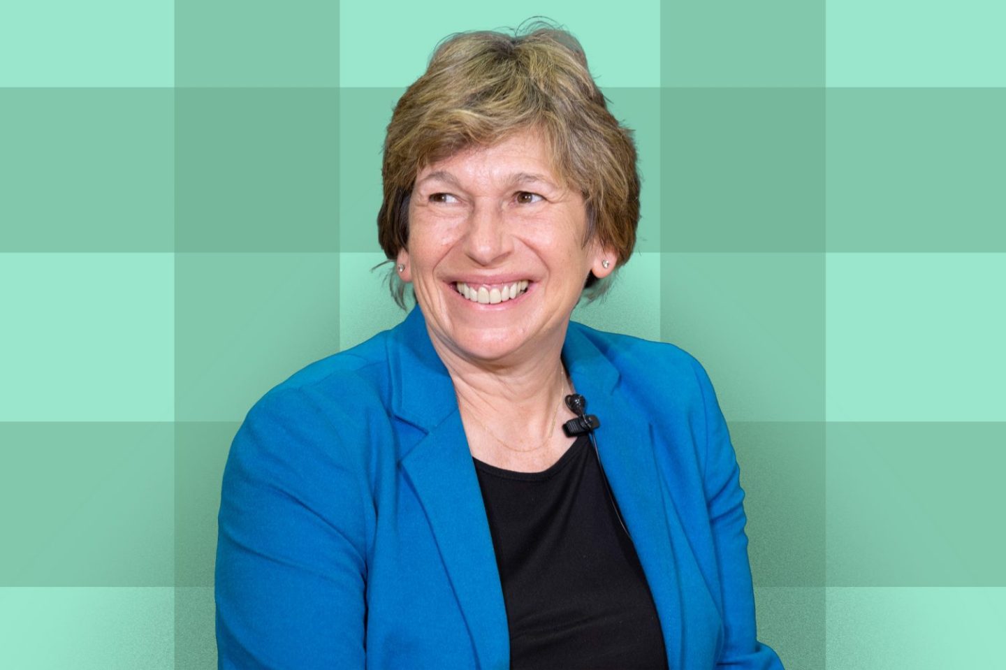 Photo of Randi Weingarten, President of American Federation of Teachers on a green grid background