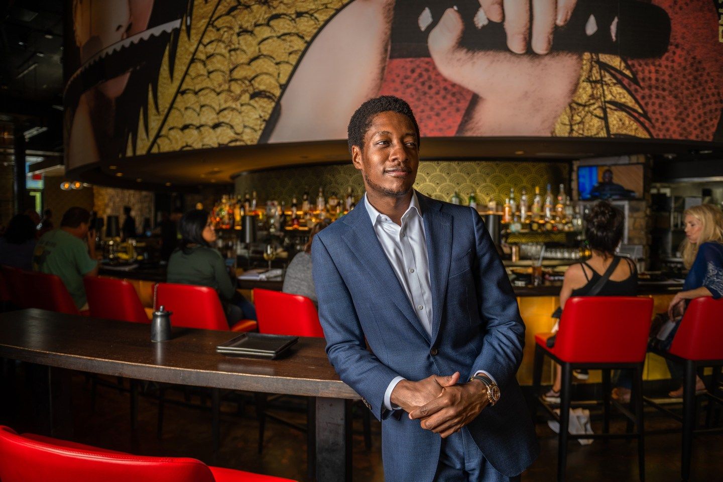 Damola Adamolekun poses for a portrait at P.F. Chang's in Scottsdale, Arizona on Friday, Oct. 21, 2022.