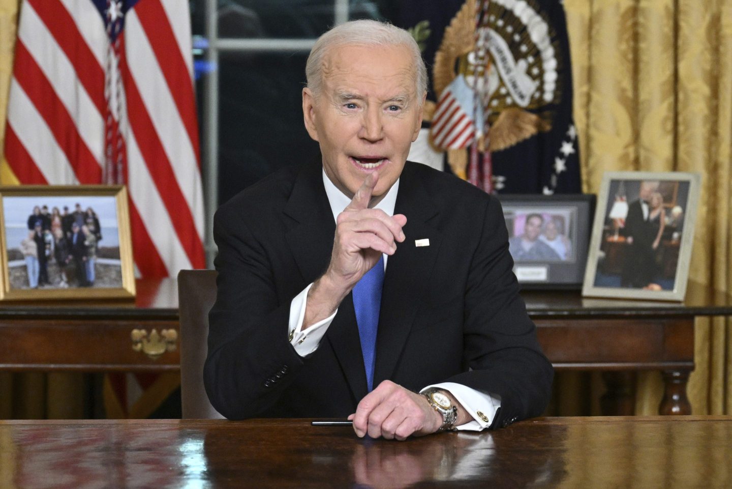 President Joe Biden speaks from the Oval Office of the White House as he gives his farewell address on Jan. 15, 2025, in Washington. 