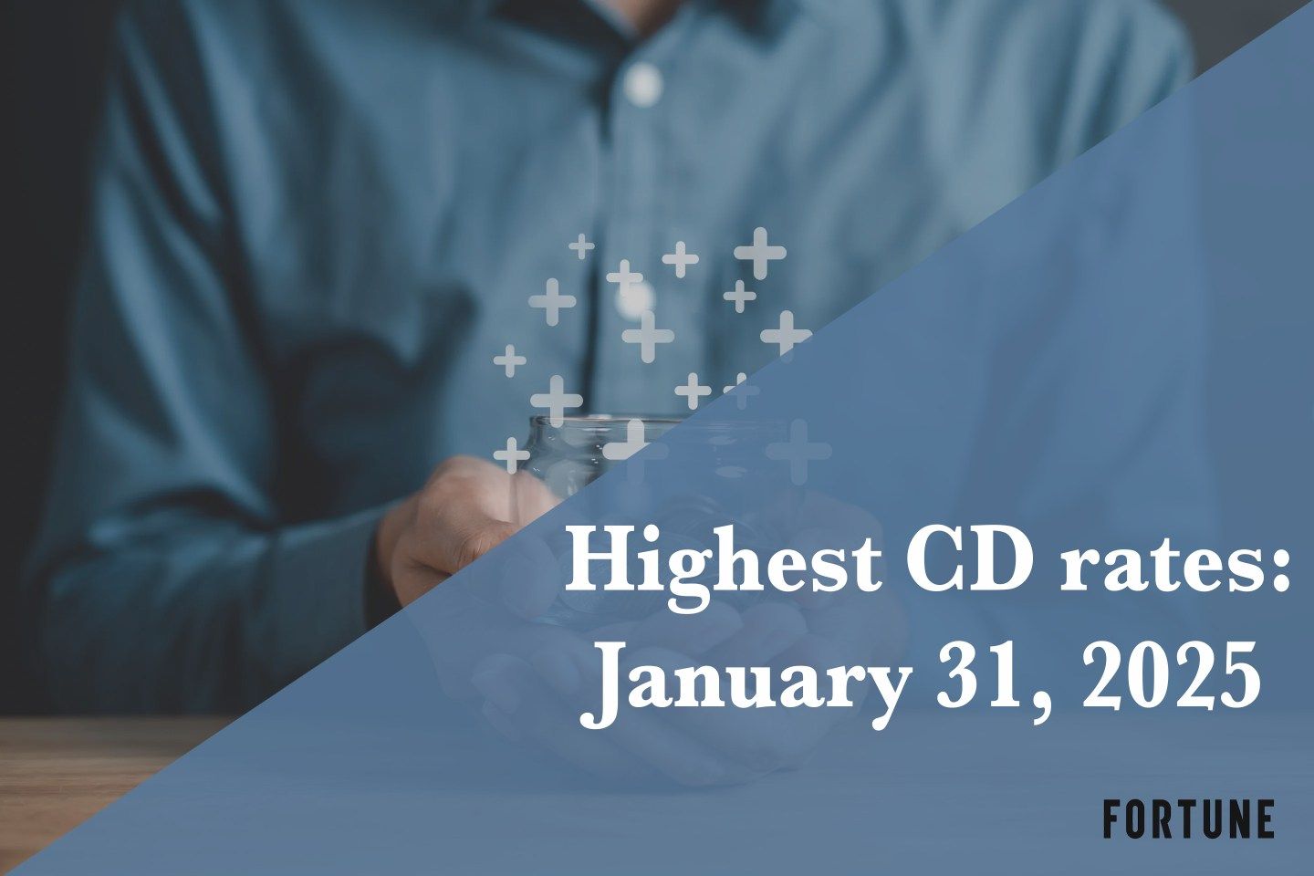 A person holding a jar full of coins.