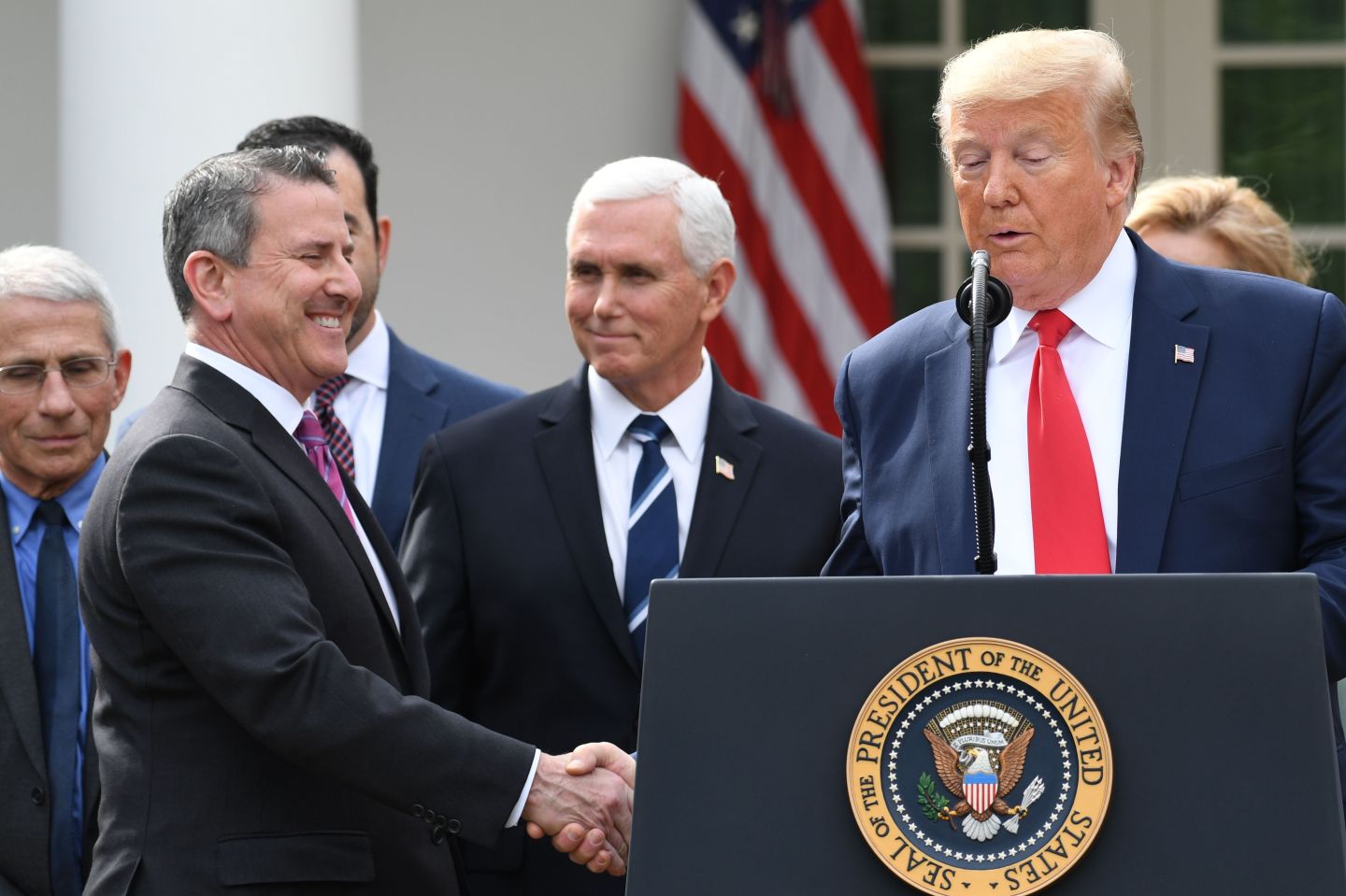 Brian Cornell, Target CEO, shakes hands with Donald Trump