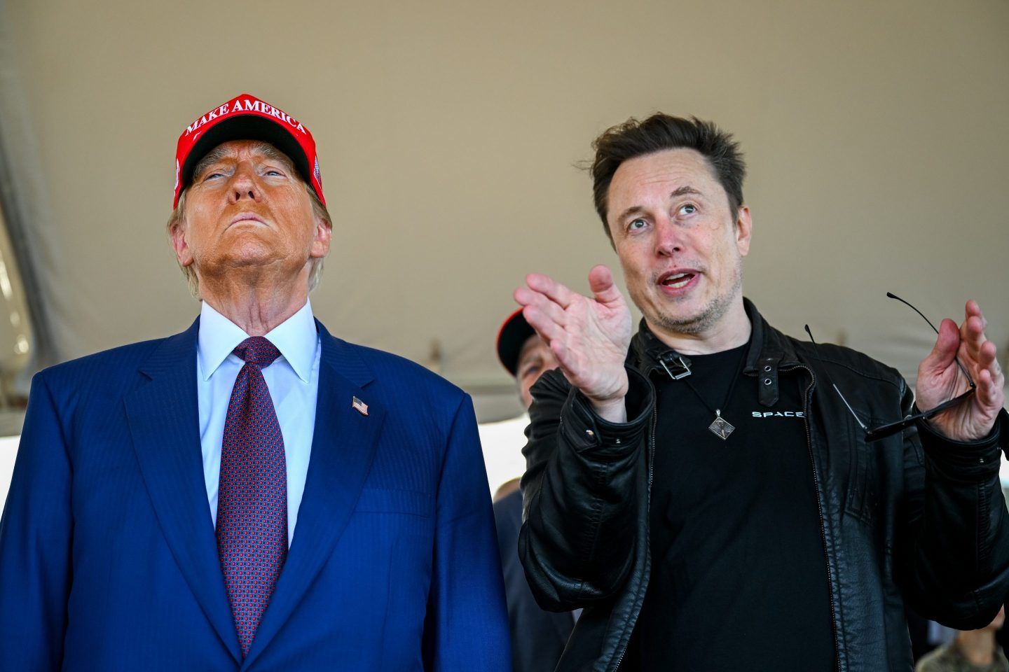 Elon Musk speaks with U.S. President-elect Donald Trump as they watch the launch of the sixth test flight of the SpaceX Starship rocket on November 19, 2024 in Brownsville, Texas. SpaceX’s billionaire owner, Elon Musk, a Trump confidante, has been tapped to lead the new Department of Government Efficiency alongside former presidential candidate Vivek Ramaswamy.