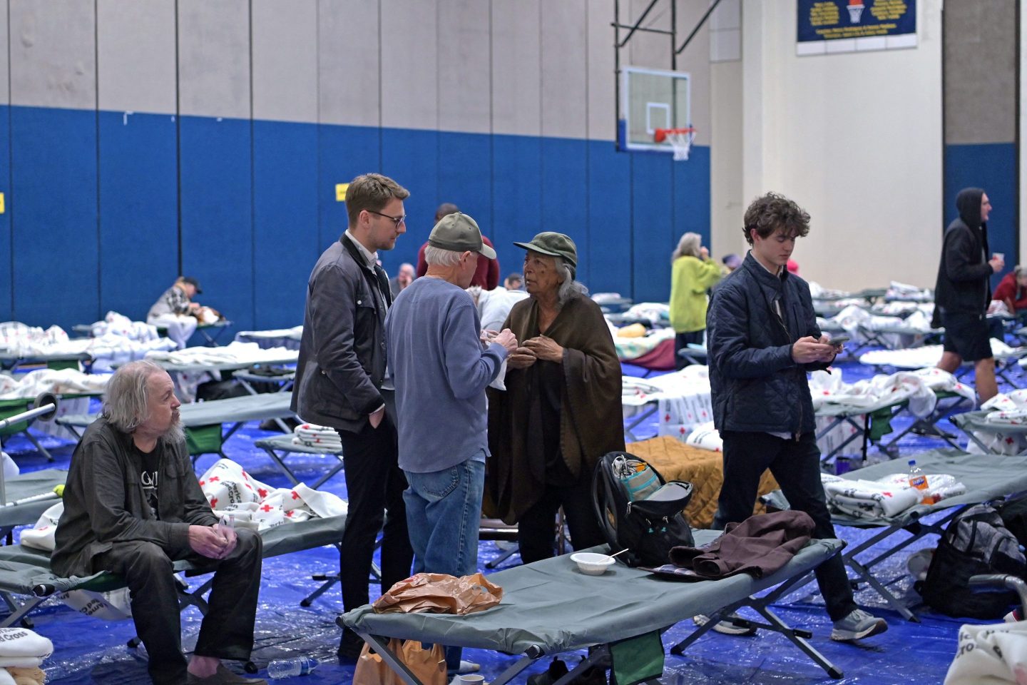 Evacuees from the Palisades fire at Westwood Recreation Center in Los Angeles on Wednesday.