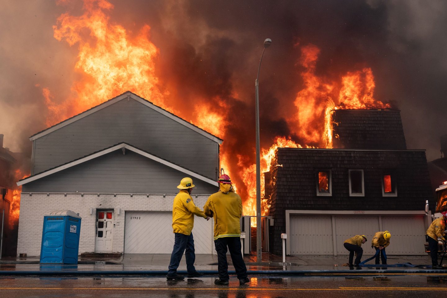 Beachfront homes go up in flames along Pacific Coast Highway near Carbon Canyon in Malibu on Wednesday.